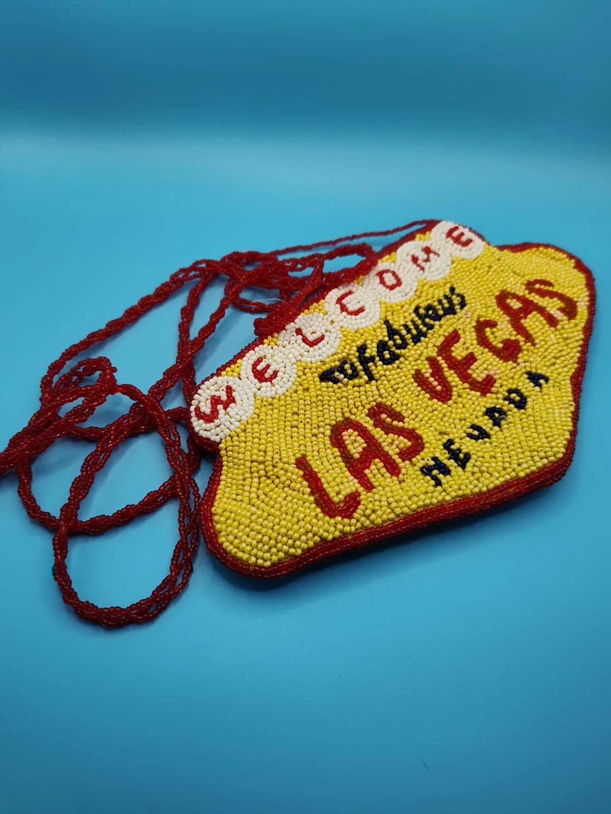 Welcome to Las Vegas yellow beaded cross over body bag NEW, w/o tags 8X4.5